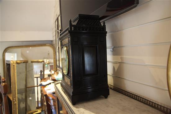 An Aesthetic movement ebonised architectural mantel clock, c.1885, height 20in.